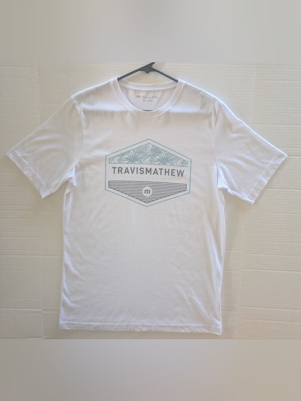 Travis Mathew White Short Sleeve Crew with Light Blue Graphic- M (NWOT)
